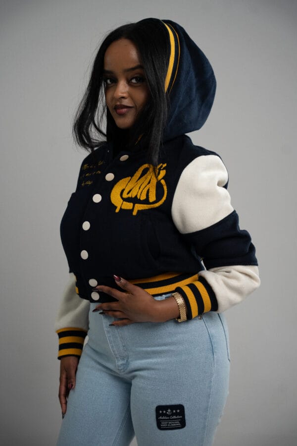 GRADOX cropped varsity jacket with hood, Hope Collection, model wearing size S