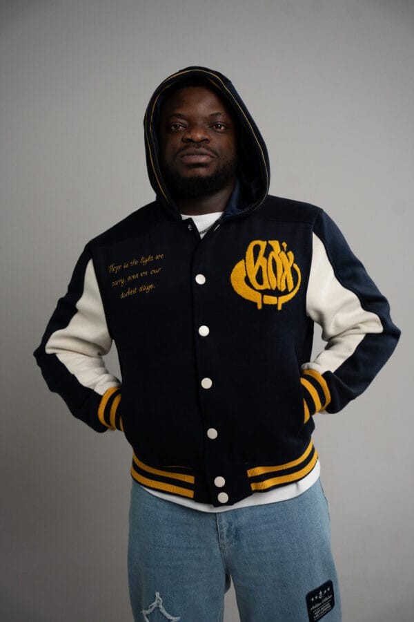GRADOX varsity jacket, model wearing size XL